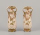 Royal Dux, 
Czech Republic.
A pair of Art 
Nouveau vases 
in porcelain.
Classic 
amphora ...
