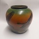 Ceramic vase 
from Peter 
Ipsen. Motif in 
relief with two 
flying ducks. 
Appears in good 
condition. ...