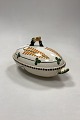 Aluminia 
Guldregn 
(Laburnum) Oval 
Bowl with lid 
No. 10/154. 
Missing handle 
on the lower 
part. ...
