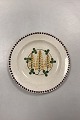 Aluminia 
Guldregn 
(Laburnum) 
Dinner Plate 
No. 10/229. 
Wear, hairline 
cracks and 
chips in 
varying ...