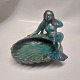 Little mermaid 
on a ceramic 
bowl. 
Presumably made 
in Iceland, as 
similar 
"mermaid bowls" 
are ...