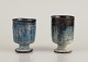 Gutte Eriksen, 
Denmark.
Two cups in 
ceramic, raku 
technique, 
flowing lava 
glaze in 
blue-gray ...