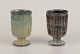 Gutte Eriksen, 
Denmark.
Two cups in 
ceramic, raku 
technique, 
flowing lava 
glaze in brown 
...