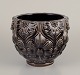 European studio 
ceramist.
Large ceramic 
flower pot 
holder.
Glazed in 
black tones.
Organic ...