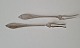 Empire pair of 
cold cut forks 
in silver from 
1909