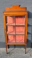 English display 
cabinet/exhibition 
cabinet with 
marquetry, 
approx. 1900. 
With glass door 
and ...