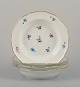 Meissen, 
Germany.
A set of four 
deep plates in 
porcelain.