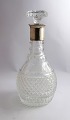 Carafe with 
silver mounting 
(830). Height 
27 cm. Produced 
1942.