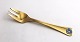 Georg Jensen. 
Silverware. 
Cake fork of 
the year 1983. 
Sterling (925) 
gilted. Length 
13.6 cm