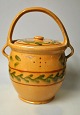 Danish 
maternity 
bucket in 
earthenware, 
19th century. 
Yellowish glaze 
with tendrils 
in green and 
...