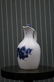 Royal 
Copenhagen Blue 
Flower Braided 
oil jug with 
lid. 
Decoration 
number: 
10/8201. 
2.sort. ...