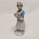 Figur af 
kvindelig 
sygeplejerske i 
porcelæn. I god 
stand uden 
skader eller 
reparationer. 
Ingen ...