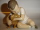 Bing & Grondahl 
Figurine, Boy 
with Dog
Decoration 
number 1951
Factory first. 

Size: 9 x ...