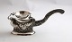 Vietnamese 
silver Tea 
strainer (900). 
Length 16 cm