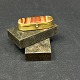 Length 5 cm.
Unusual box 
for pins in 
brass with 
ribbon agate.
The box has a 
curved inside 
so ...