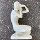 Women figure 
made in 
plaster.
Start 1900. 
Some patina but 
no Magee 
damaged or 
repair.
40 cm high.