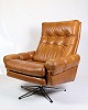 The armchair in 
cognac leather, 
an example of 
Danish design 
from the 1980s, 
radiates both 
...