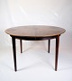 This round 
rosewood dining 
table, designed 
by renowned 
Danish 
furniture 
designer Arne 
Vodder in ...