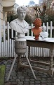 Old wooden 
chopping block 
with light gray 
patinated 
paint.
Super nice as 
a pedestal for 
a bust ...