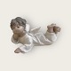 Lladro figure, 
Reclining 
angel, 15cm 
wide *Perfect 
condition*