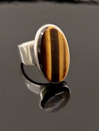 N E From sterling silver ring with tiger's eye