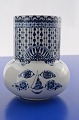 Decorated 
ceramic vase, 
white with blue 
glaze Bjorn 
Wiinblad vase 
with a lady's 
face, no. ...