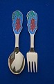 Michelsen 
Christmas 
spoons and 
Christmas forks 
of gilt 
sterling 
silver. 
Anton 
Michelsen set 
...