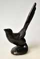 Danish artist 
(20th century): 
A bird. 
Patinated 
metal. 
Unsigned. H: 
12.8 cm.