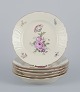 Royal 
Copenhagen 
"Frijsenborg". 
Six luncheon 
plates in 
hand-painted 
porcelain with 
floral motifs 
...