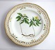 Royal 
Copenhagen. 
Flora Danica 
plate. Diameter 
25 cm. (3553). 
(1 quality). 
Anemone 
ranunculoidi 
...