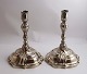 German silver 
candlesticks. 
Johan Balthasar 
Heckenauer 
Ausburg 
(1746-1779). A 
pair. Height 20 
cm.