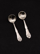 A pair of French Lily  silver salt spoons