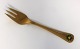 Georg Jensen. 
Silverware. 
Cake fork of 
the year 1982. 
Sterling (925) 
gilted. Length 
13.6 cm