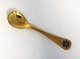 Georg Jensen. 
Silver cutlery. 
Year's teaspoon 
1986. Sterling 
(925) gilt. 
Length 11.2 cm