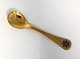 Georg Jensen. 
Silver cutlery. 
Year's teaspoon 
1986. Sterling 
(925) gilt. 
Length 11.2 cm