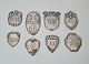 Lot of 8 silver 
coat shield 
Stamped: 830s 
- 826s