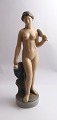 Royal 
Copenhagen. 
Porcelain 
figure. 
Standing naked 
woman with 
mirror. Model 
4639. Height 
25.5 ...