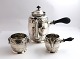 A. Steffensen, 
Copenhagen. 
Silver coffee 
service (830). 
3 parts. Height 
of the coffee 
pot 16.5 ...