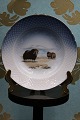 Bing & Grøndahl lille dyb tallerken med grønlandske motiver 
og guldkant. Muskus okser...