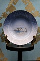 Bing & Grondahl small deep plate with Greenlandic motifs and with gold rim.  
Seals / Puisit...