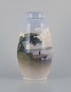 Royal 
Copenhagen, 
lidded 
porcelain vase.
Hand-painted 
motif of a 
Danish 
landscape.
Model: ...