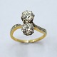 A diamond ring in 18k gold and white gold, total app. 1,83 ct.