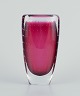 Vicke 
Lindstrand for 
Kosta Boda, 
vase in purple 
and clear art 
glass. Internal 
bubbles.
Model ...