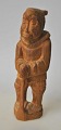 Greenlandic 
woodcarver/artist 
(20th century): 
A Greenlandic 
woman. Teak. 
Signed: PA. H.: 
22 ...