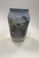 Royal 
Copenhagen Vase 
No 2776/1217 
with landscape 
and birds
Measures 25 cm 
(9 27/32 in.)