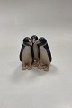 Royal 
Copenhagen 
Figurine - 
Penguin Trio 
No. 1284. 
Designed by 
Anna Trap. 
Measures 10 cm 
x 9 cm ...