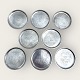 Just Andersen, 
Pewter bottle 
trays with 
Copenhagen 
motifs, 8cm in 
diameter, Stamp 
2387, 8pcs. ...