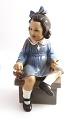 Dahl Jensen. 
Porcelain 
figure. Girl 
with berries 
"Else". Model 
1207. Height 19 
cm. (1 quality)