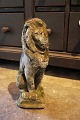Old French 
sandstone lion 
with a super 
fine patina. 
Height: 37cm. 
(Decorative 
both outside 
and ...