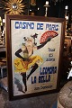 Antique French 
hand-painted 
advertising 
poster on 
canvas with a 
very fine 
patina from 
around ...